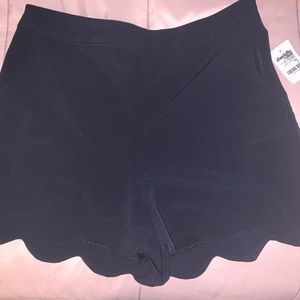 Scalloped trim, stretchy shorts